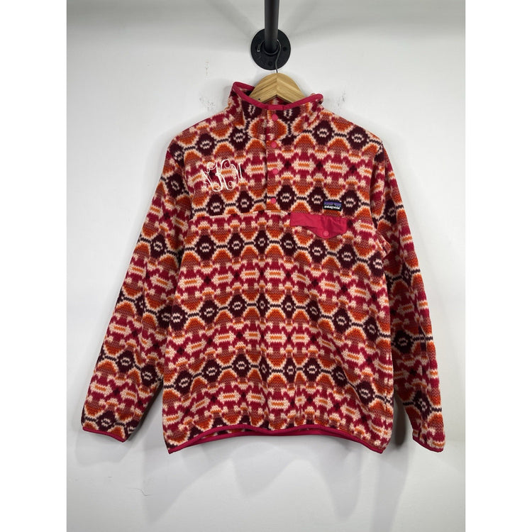 Patagonia women’s Lightweight Synchilla Snap-T Pullover in pink Aztec print L