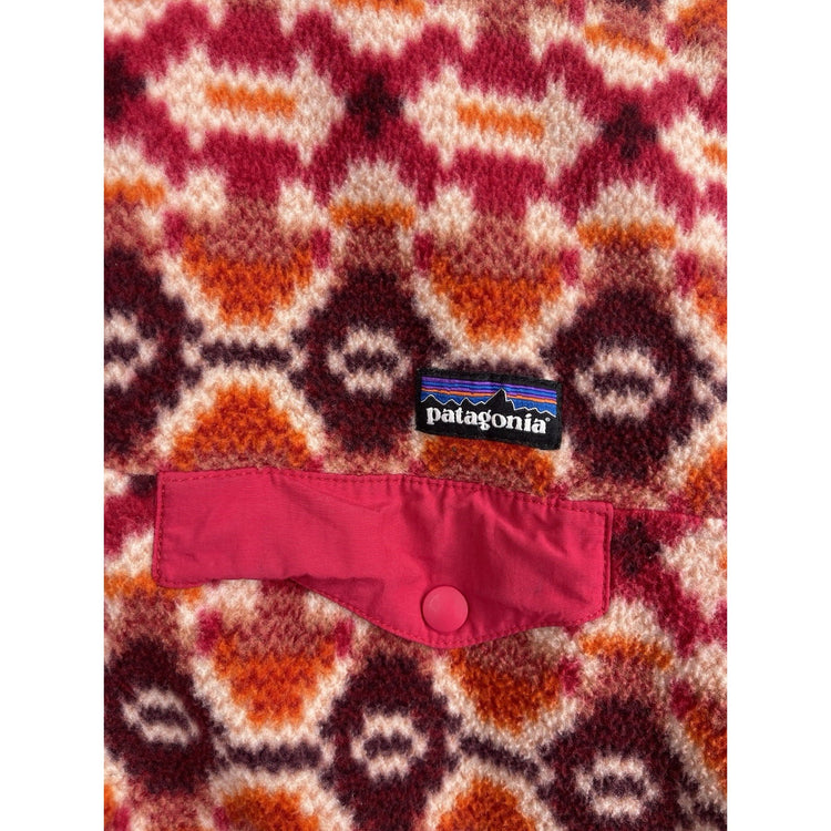 Patagonia women’s Lightweight Synchilla Snap-T Pullover in pink Aztec print L