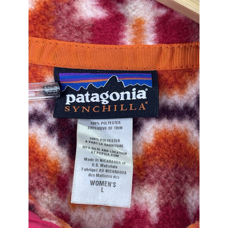 Patagonia women’s Lightweight Synchilla Snap-T Pullover in pink Aztec print L