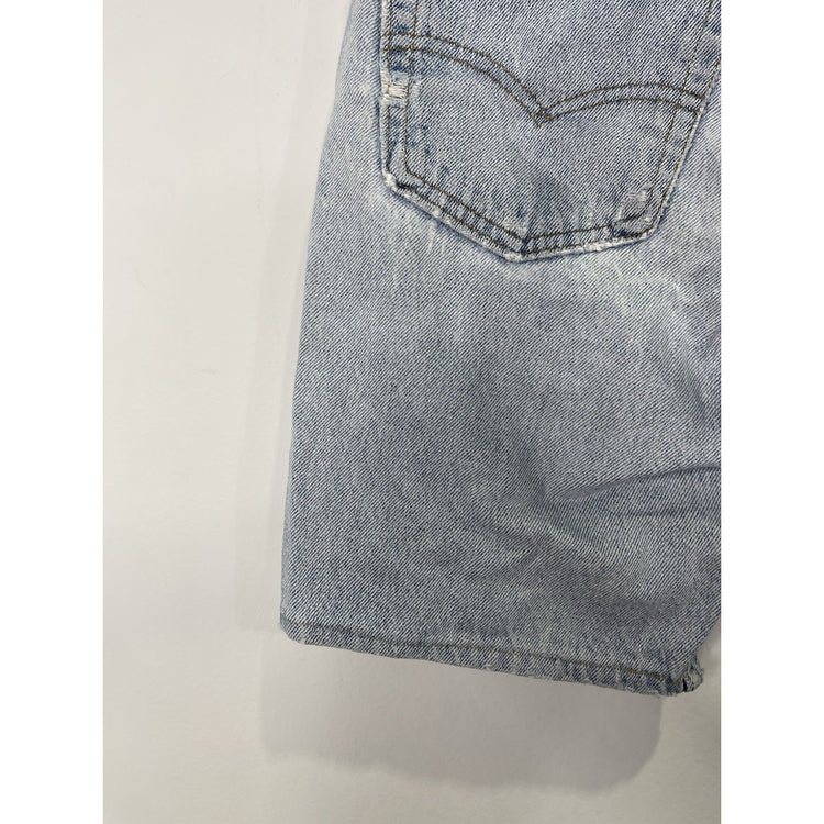 90s Vintage distressed women’s Levi Jean shorts Sz 32