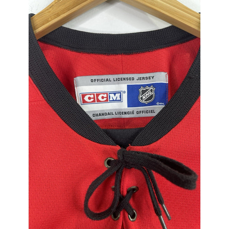 CALGARY FLAMES NHL ICE HOCKEY JERSEY SHIRT CCM RED / BLACK SIZE L